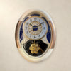 Luxurious Oval Wall Clock with Floral Crystal Pendulum